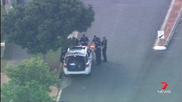 Police meet to discuss their tactics after a person reportedly fired a shot at a Joyner property.