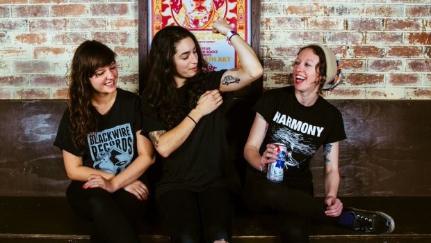 Camp Cope bassist Kelly-Dawn Hellmrich, with frontwoman Georgia Maq and drummer Sarah Thompson. 