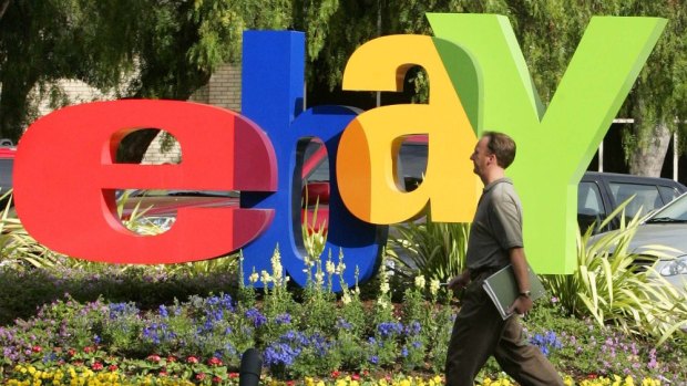 eBay is considering separating its two successful businesses, sources say.