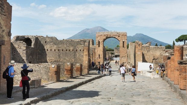 The archaeological site of Pompeii, with Mount Vesuvius in the background. 