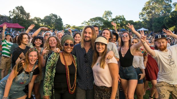 Tame Impala's Kevin Parker and The Waifs' Donna Smith, pictured with organiser Danielle Loizou Lake, joined protesters for Live! At the Wetlands on Monday.