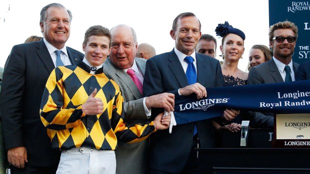 The rich, powerful and famous: Royal Randwick attracted luminaries such as Prime Minister Tony Abbott, actor Simon Baker and radio broadcaster Alan Jones to the Championships.