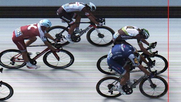 Photo finish: Marcel Kittel (bottom) crosses the finish line ahead of Norway's Edvald Boasson Hagen to win Stage seven.