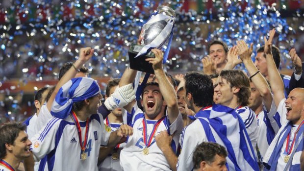 Karagounis celebrates winning Euro 2004 with his teammates.