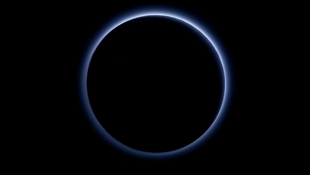 The blue-tinged atmosphere of Pluto as taken by the New Horizon probe.