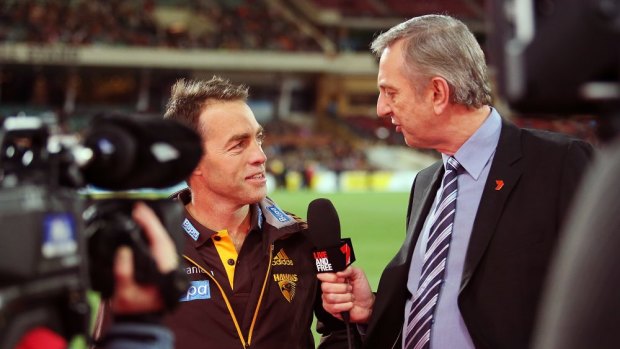 Hawthorn coach Alastair Clarkson is interviewed by Dennis Cometti of Channel Seven.