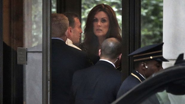 Ms Credlin, pictured with Mr Abbott during a visit with Mr Murdoch in New York last year. 