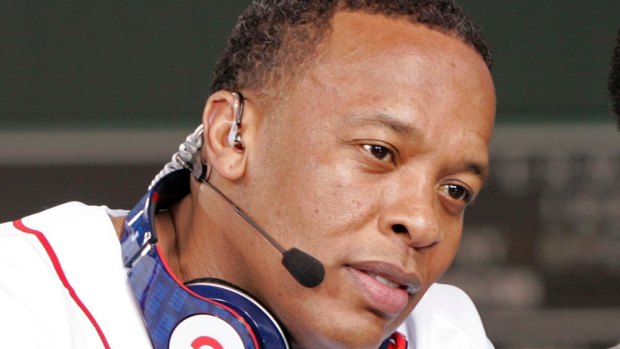 Recording artist Dr Dre wears a pair of Beats headphones.