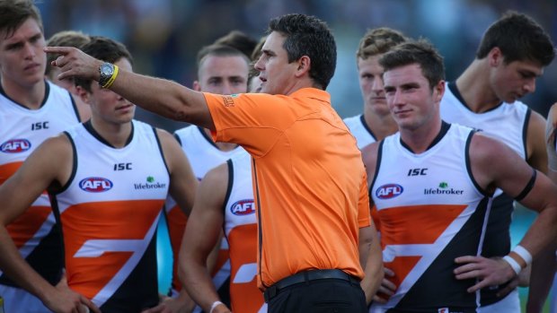 GWS coach Leon Cameron speaks to his players during their last match against West Coast.