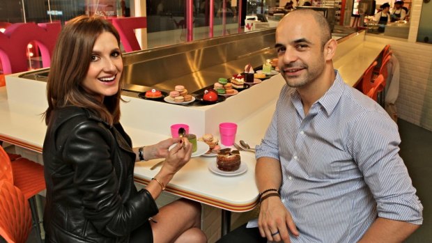 How sweet it is: Adriano Zumbo with Kate Waterhouse in his shop in Pyrmont.
