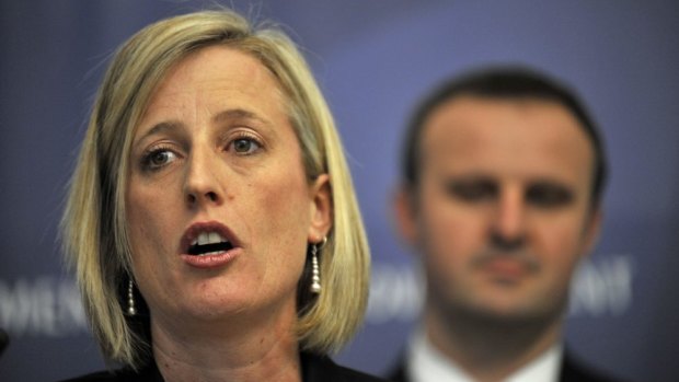 Incumbent: Katy Gallagher's resignation as ACT Chief Minister is set to give Andrew Barr (background) the ACT Labor leadership.