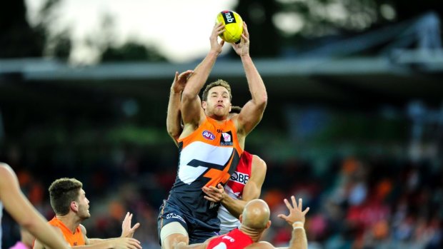 Former Swan Shane Mumford in action for the GWS Giants against his old club in the 2014 pre-season at Manuka Oval.