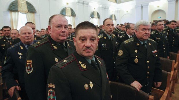 High-ranking officers of Ukraine's army listen to a speech by new Defence Minister Valery Heletey after he was endorsed by Kiev's parliament. 