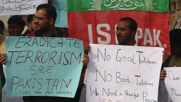 People protest in Peshawar against the attack on a beloved Sufi shrine, the Lal Shahbaz Qalandar.