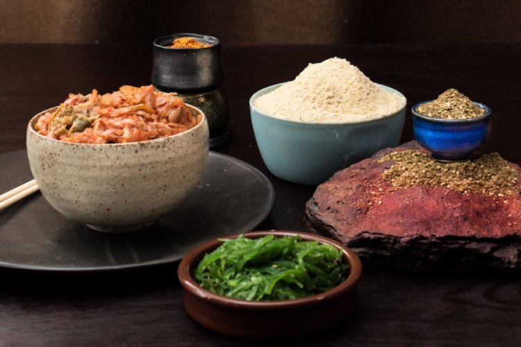 Clockwise from left: Kimchi, togarashi, chickpea flour, zaatar and seaweed.