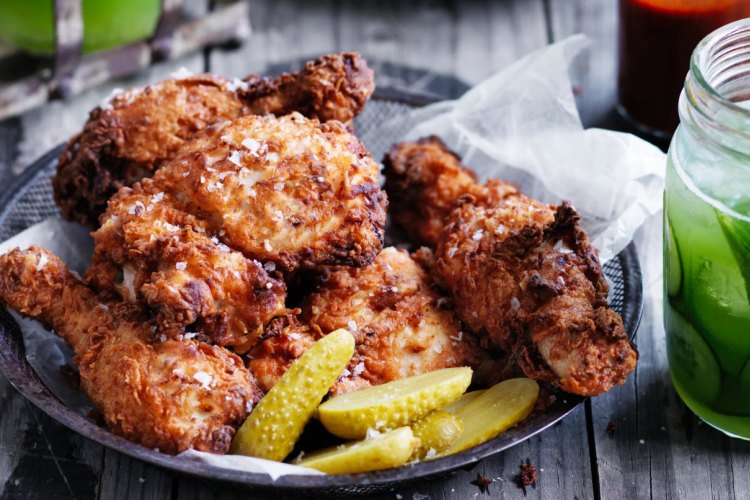 Chilled sriracha-fried chicken and pickles.