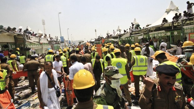 Emergency workers and pilgrims to Mecca gather around those crushed in the stampede in Mina, Saudi Arabia. 