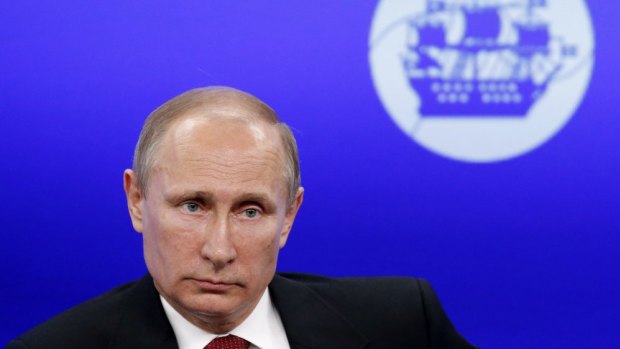 Russian President Vladimir Putin accuses the US of choreographing a "coup" in February. 