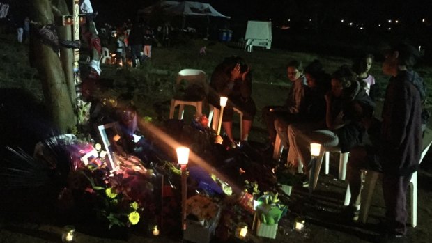 The community in Kalgoorlie pay their respects to teen Elijah Doughty at a vigil on Wednesday night