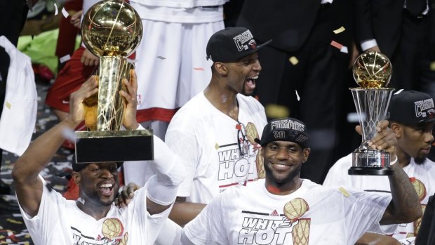 Glory days: The Miami Heat's Dwyane Wade, Chris Bosh and LeBron James after winning the 2013 NBA title.