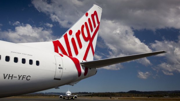 The Virgin flight was Sydney-bound when the passenger's unruly behaviour caused it to be turned around.
