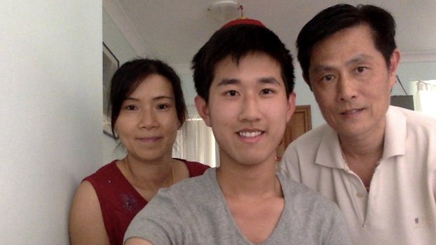 Daniel Hu and his parents.