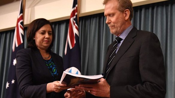 CCC chairman Alan MacSporran, pictured with Premier Annastacia Palaszczuk, says complaints related to local government rise in the weeks before elections.