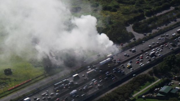 A truck caught alight on the M1 at Loganholme.
