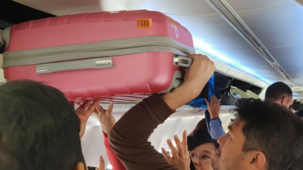 Oversized bags are creating havoc on domestic flights.