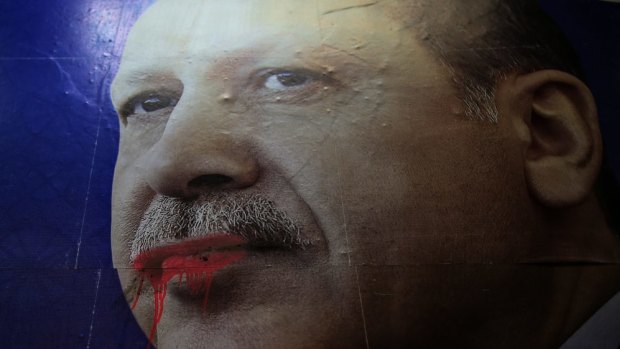 Overreaching: A huge poster of Turkish Prime Minister Recep Tayyip Erdogan seen in the city centre in Istanbul. His attempts to block Twitter failed spectacularly.  