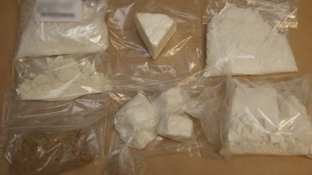 Police have seized more than three kilograms of powder, allegedly dangerous drugs, during a raid near the Brisbane CBD.