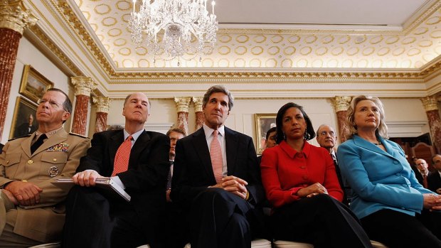 In 2011, chairman of the Joint Chiefs of Staff Admiral Mike Mullen, National Security Adviser Tom Donlion, Senator John Kerry, UN Ambassador Susan Rice and Secretary of State Hillary Clinton listen to President Barack Obama deliver a speech on Mideast and North Africa policy. 