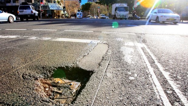 NSW councils face a huge backlog in road maintenance funding, the NRMA warns.