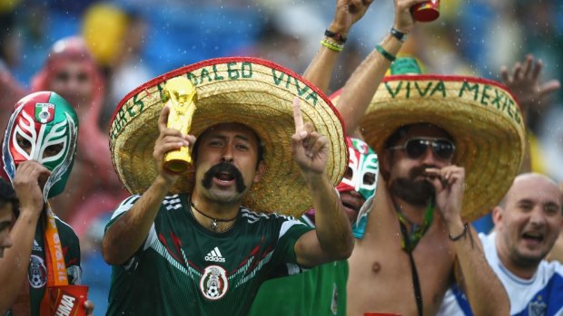 Mexico fans show their support their team at Estadio das Dunas in Natal.