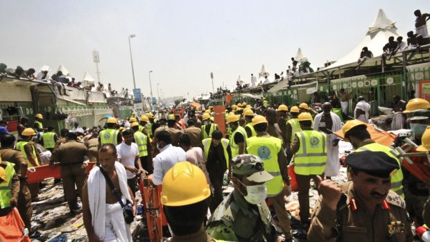 Emergency workers and pilgrims to Mecca gather around those crushed in the stampede in Mina, Saudi Arabia. 