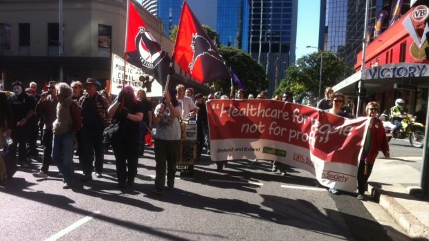 Protesters take to the streets of Brisbane.