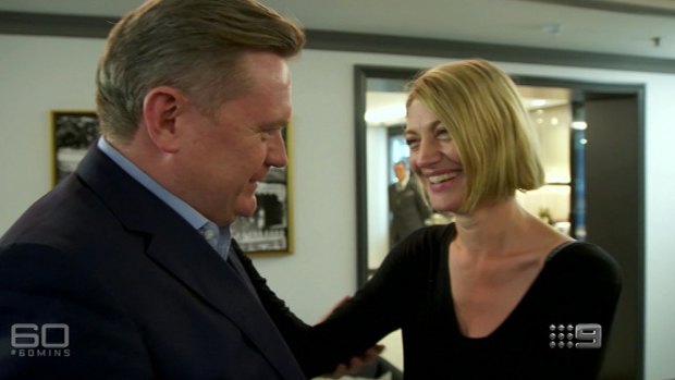 Michael Usher greets colleague Tara Brown at the beginning of a 60 Minutes interview on Lebanon.