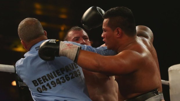Victory: The referee intervenes in Paul Gallen's fight against Herman Ene-Purcell 
