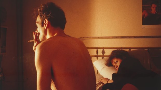 Nan and Brian in bed, New York City, 1983, by Nan Goldin in Tough and Tender at the National Portrait Gallery.