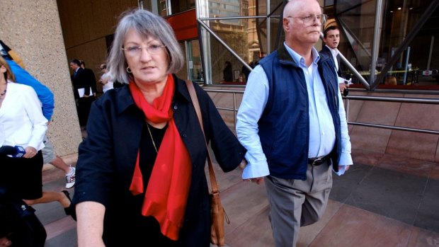 Raymond and Margaret Sutton leave court after being handed good behaviour bonds over the death of their son in 2001.
