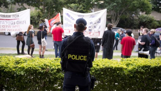 Students protesting at a Brisbane event featuring Liberal Senator Cory Bernardi.