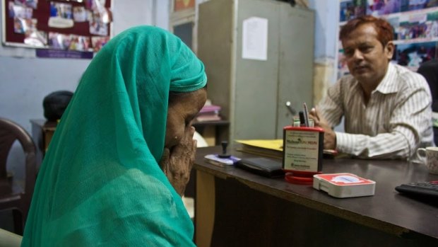 A victim speaks to counsellor Nadeem Ahmed in a women's crisis centre in north-west Delhi.