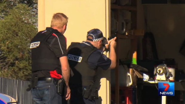 Police at the scene of a siege on the Gold Coast.