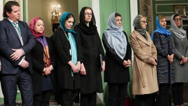 Sweden's "first feminist government" don hijabs in Iran.