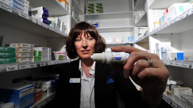 Capital Chemist Pharmacist Amanda Galbraith holding antibiotic eye drops. Amanda talks about how people should abide by expiry dates on medications and eye drops.