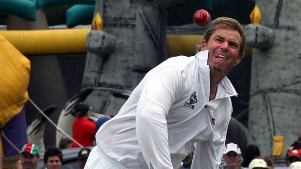 Bowled Warnie ... Shane Warne rolls the arm over during a charity game in 2007.