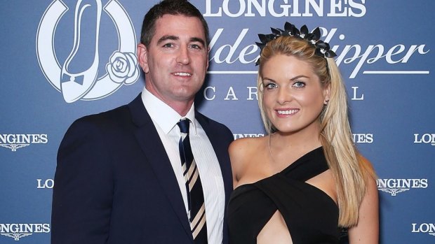 Erin Molan and her boyfriend Sean Ogilvy pose during Golden Slipper Day at Rosehill Gardens in 2016.