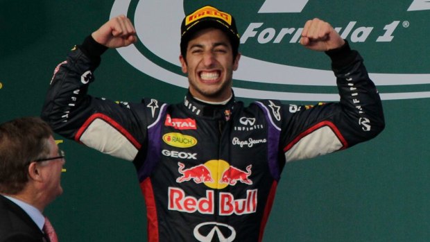 Joy before the pain: Daniel Ricciardo on the podium at Albert Park in 2014 before he was controversially disqualified. 