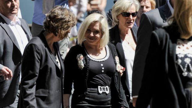Harris' daughter Bindi Nicholls (centre) is among those who have signed the petition 