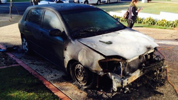 The torched car. 